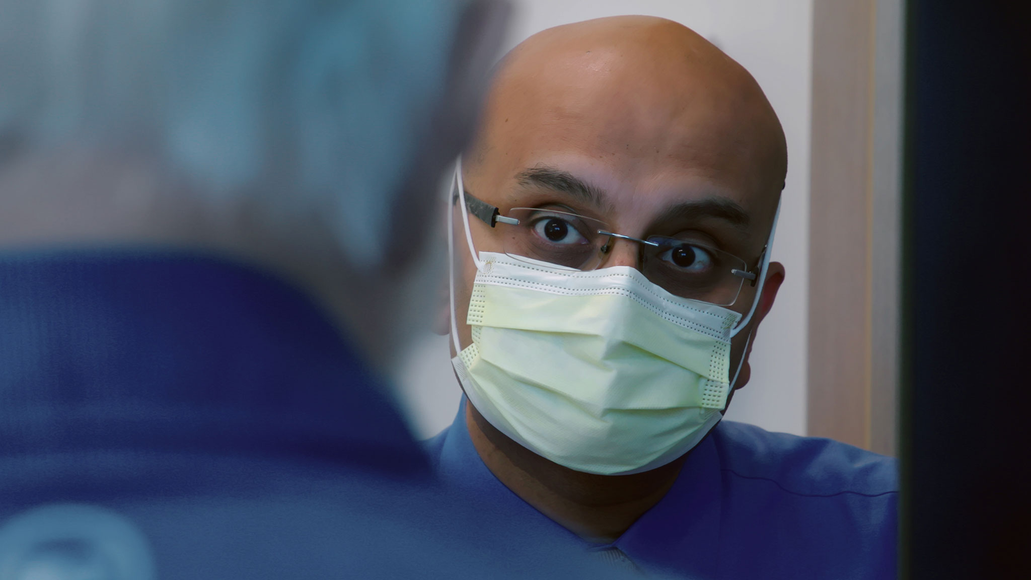 Dr. Sriram Machineni listens to a patient in documentary about how weight impacts health